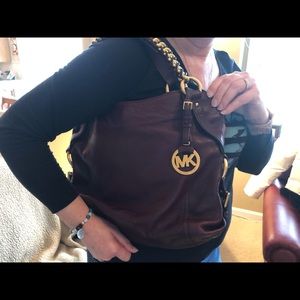 Burgundy Michael Kors handbag